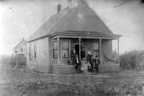 Print from large post card negative.  GWI Jones and Family. R to L: Top - Ben GWI and Ray. Bottom - Pha, LaDora, Marcia (Aurelius), Robert, Hazel (Jones) Aurelius, George and CV. Location unknown.